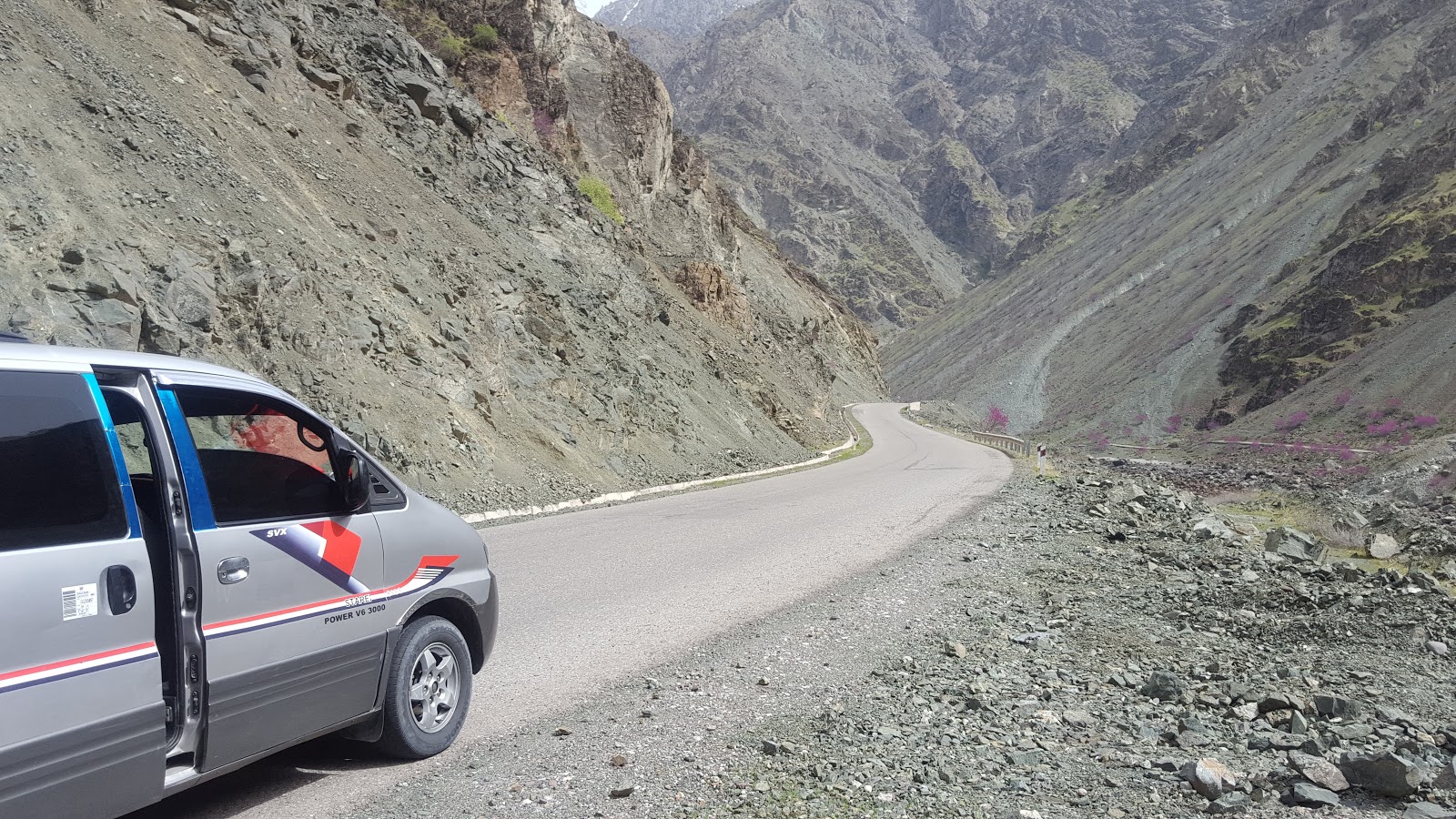 Panj Travel tour vehicle on a mountain road